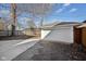 Exterior view of the garage with a driveway and fencing in the background at 3645 N Delaware St, Indianapolis, IN 46205