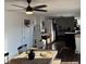 Cozy dining area featuring a rustic wood table, modern decor, and a spacious layout at 3703 Church Dr, Anderson, IN 46013