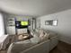 Bright living room featuring a comfortable sectional sofa and built-in shelving at 3703 Church Dr, Anderson, IN 46013