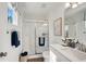 Bright bathroom featuring a glass enclosed shower, modern vanity, and stylish decor at 3917 Wren Dr, Brownsburg, IN 46112