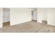 A bright bedroom features plush carpeting and access to a bathroom and closet at 3917 Wren Dr, Brownsburg, IN 46112