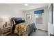 Cozy bedroom featuring a decorative bed frame, coordinated linens, and a window view at 3917 Wren Dr, Brownsburg, IN 46112