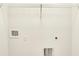 Interior view of a closet showing open shelving and a utility hookup at 3917 Wren Dr, Brownsburg, IN 46112