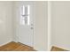 A bright white entry door with glass inserts allows natural light to fill the entryway at 3917 Wren Dr, Brownsburg, IN 46112