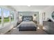 This main bedroom has large windows, soft gray tones, and lots of natural light at 3917 Wren Dr, Brownsburg, IN 46112