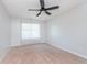 Bedroom with neutral carpet, ceiling fan and window offering natural light and a comfortable space at 4313 Strawflower Dr, Indianapolis, IN 46203