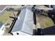 Aerial view of a home with a shingled roof, backyard, and nearby homes at 4619 Carrollton Ave, Indianapolis, IN 46205