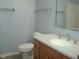 Bathroom featuring vanity with a sink, a mirror, and a toilet at 515 Bridgestone Dr, Mooresville, IN 46158