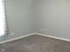 Neutral bedroom with plush gray carpeting and ample wall space at 515 Bridgestone Dr, Mooresville, IN 46158
