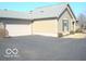Charming exterior of home with an attached garage and well maintained landscaping at 515 Bridgestone Dr, Mooresville, IN 46158