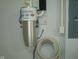 Modern central vacuum system installed on a white wall near the circuit breaker at 515 Bridgestone Dr, Mooresville, IN 46158