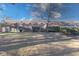 Sprawling backyard with large lawn, rear facade of building with decks and patios at 5525 Roxbury Ter, Indianapolis, IN 46226