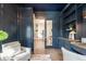 Well-appointed home office with custom built-ins, modern decor, and ample natural light at 5537 Broadway St, Indianapolis, IN 46220
