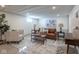 Finished basement living room with modern decor, neutral colors, and recessed lighting at 5537 Broadway St, Indianapolis, IN 46220