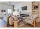 Comfortable living room with a modern fireplace, built-in shelving, and stylish furnishings at 5537 Broadway St, Indianapolis, IN 46220