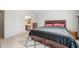 Spacious main bedroom with ensuite bathroom and neutral-colored walls at 5721 Quail Crossing Dr, Indianapolis, IN 46237