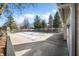 View of a covered pool area with a surrounding fence and some trees in the background at 5721 Quail Crossing Dr, Indianapolis, IN 46237