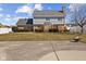 Well-maintained backyard featuring a cozy fire pit, and a nicely landscaped lawn at 5732 Bold Ruler Dr, Indianapolis, IN 46237