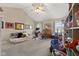 Bedroom with vaulted ceilings, ceiling fan, and windows providing natural light at 5732 Bold Ruler Dr, Indianapolis, IN 46237
