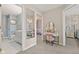 Hallway view leading to bedrooms and a bathroom, complete with a vanity area at 5732 Bold Ruler Dr, Indianapolis, IN 46237