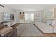 Comfortable living room with a large sectional sofa, TV, and stylish decor at 5732 Bold Ruler Dr, Indianapolis, IN 46237