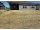 View of home's exterior with freshly planted backyard at 6635 Sulgrove Pl, Indianapolis, IN 46221