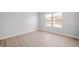 Bright bedroom with a large window and modern flooring, offering a serene and inviting space at 6677 W Longview Dr, McCordsville, IN 46055