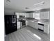 Beautiful kitchen with stainless steel appliances and ample cabinet space at 6677 W Longview Dr, McCordsville, IN 46055