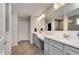 A bright and spacious bathroom featuring double sinks, modern fixtures, and a walk-in shower at 6919 Sable Point Dr, Brownsburg, IN 46112