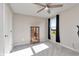 Neutral bedroom with window for natural light and classic curio cabinet at 6919 Sable Point Dr, Brownsburg, IN 46112