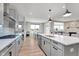 Beautiful modern kitchen features stainless steel appliances, a large island, and an open layout at 6919 Sable Point Dr, Brownsburg, IN 46112