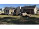 Large backyard with a patio area, perfect for entertaining guests and enjoying the outdoors at 70 Joseph Ln, Whiteland, IN 46184