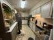 Functional kitchen with white cabinets, granite countertops, and tiled backsplash at 70 Joseph Ln, Whiteland, IN 46184