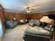 Spacious living room with tiled floor, plantation shutters, ceiling fan, and two sofas at 70 Joseph Ln, Whiteland, IN 46184