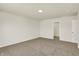 Spacious bedroom with a closet and neutral-toned walls and carpet at 7168 Jackson Dr, Cumberland, IN 46229