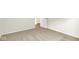 Clean bedroom featuring neutral carpeting, white trim, and an open doorway at 7168 Jackson Dr, Cumberland, IN 46229