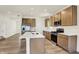 Modern kitchen with stainless steel appliances, quartz countertops, and center island at 7168 Jackson Dr, Cumberland, IN 46229
