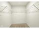 Large walk-in closet featuring extensive wire shelving at 7168 Jackson Dr, Cumberland, IN 46229