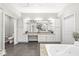 Bright bathroom with an expansive vanity, dual sinks, and a large mirror, providing a luxurious feel at 720 S Rangeline Rd # 703, Carmel, IN 46032
