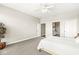 Spacious bedroom featuring neutral paint and an open doorway to the bathroom at 720 S Rangeline Rd # 703, Carmel, IN 46032