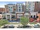 Charming mixed-use building with retail shops and residences on a tree lined street at 720 S Rangeline Rd # 703, Carmel, IN 46032