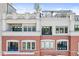 Luxurious residence showing balcony, brick facade, and beautiful architectural detail at 720 S Rangeline Rd # 703, Carmel, IN 46032