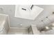 Unique skylight feature above with pendant lights and crown molding at 720 S Rangeline Rd # 703, Carmel, IN 46032