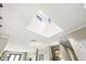 Unique skylight feature above with pendant lights and crown molding at 720 S Rangeline Rd # 703, Carmel, IN 46032