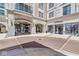 Charming town center featuring boutique shops, inviting entrances, and brick-paved walkways for a delightful experience at 720 S Rangeline Rd # 703, Carmel, IN 46032