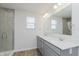 Bright bathroom with double vanity, modern fixtures, and tiled walk-in shower at 7324 Shroyer Way, Noblesville, IN 46062