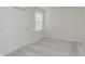 Cozy bedroom featuring neutral carpet and a window bringing in natural light at 7324 Shroyer Way, Noblesville, IN 46062