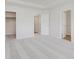 Spacious bedroom featuring plush carpet floors and multiple walk-in closets at 7324 Shroyer Way, Noblesville, IN 46062