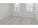 Bedroom with plush carpet floors and a window allowing for natural light at 7324 Shroyer Way, Noblesville, IN 46062