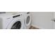 Bright laundry room featuring a Whirlpool washer and dryer set for convenient in-home cleaning at 7324 Shroyer Way, Noblesville, IN 46062